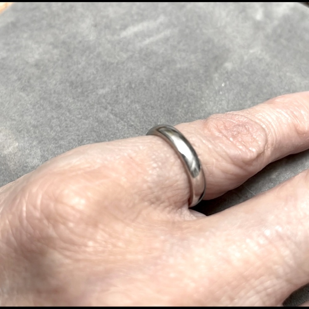 Solid ring. Silver.  Not stamped